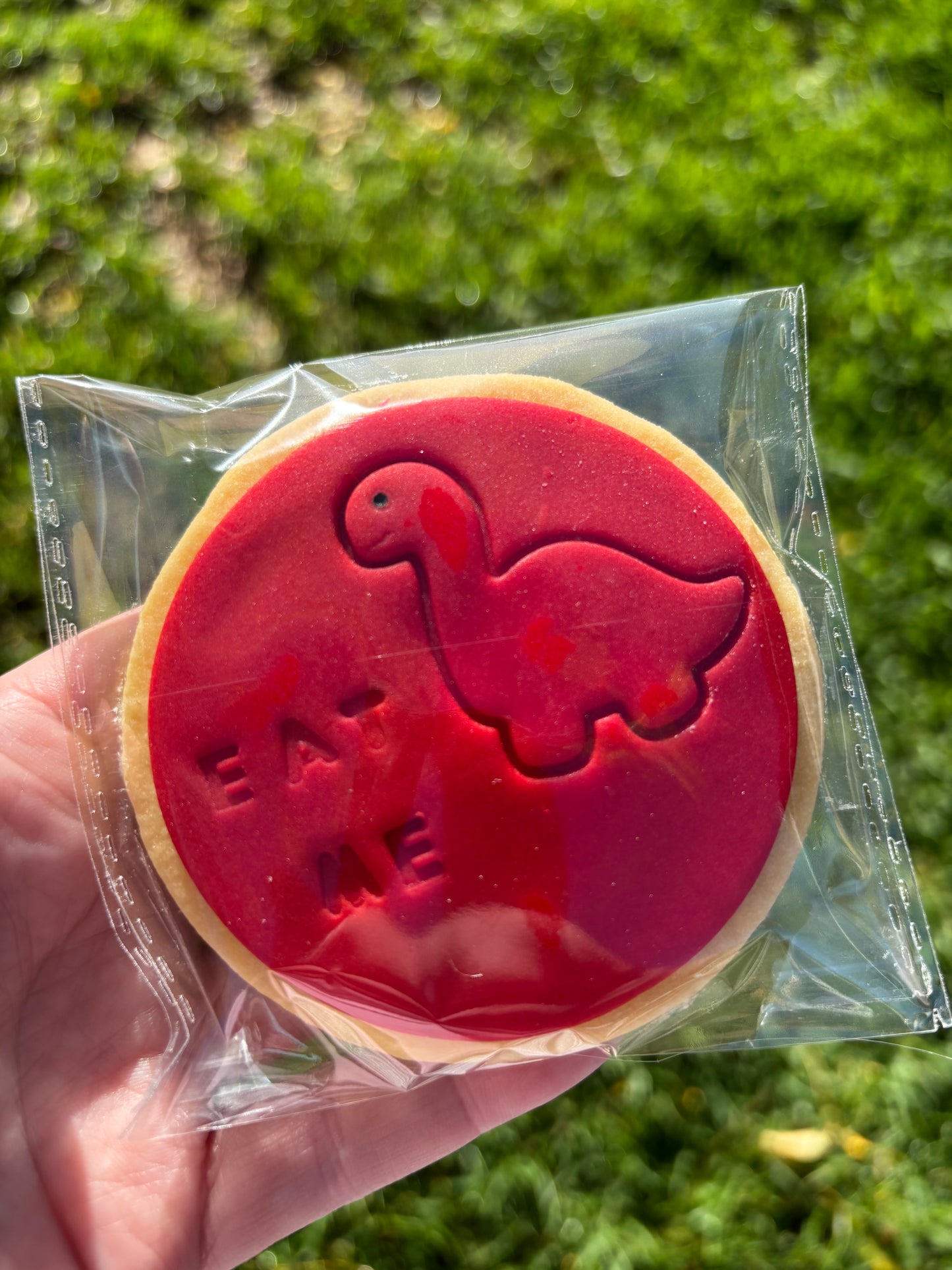 Red Brachiosaurus with EAT ME