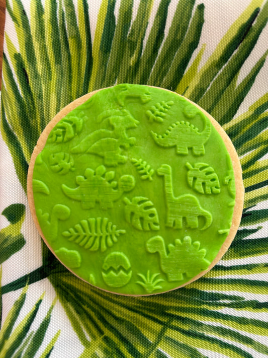 Green round dinosaur patterned cookie